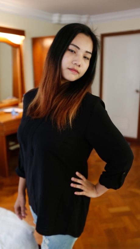 Beautiful Asian babe Meew shows off her stunning big boobs up close