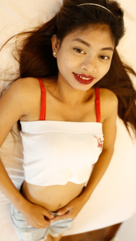Asian girl Princess C shows off her petite body while stripping for POV sex