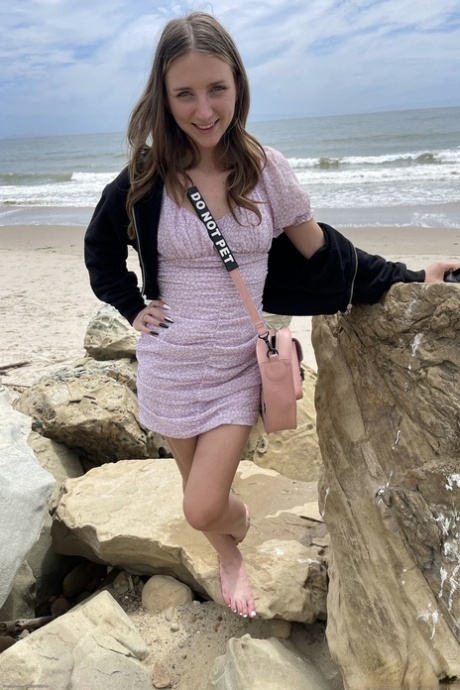 Beautiful teen Macy Meadows shows her tiny tits and presents her pussy