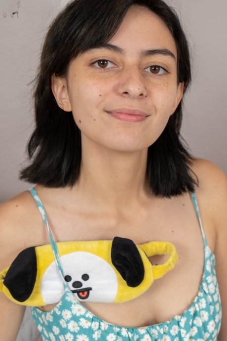 Teen Alonya flaunts her tits and hairy armpits before spreading her bushy twat